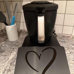 Miriam added a photo of their purchase