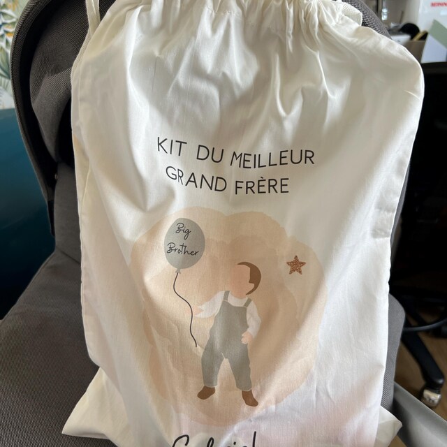 Kit Super Grande Sœur - Pochon Cadeaux Avec Bracelet, Bavoir, Graines à Planter, Carte, Règles D'Or Et Bons | Cadeau Annonce Naissance
