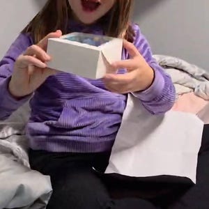 Rebekkah added a photo of their purchase