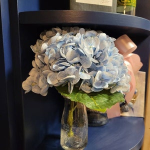 Shelly added a photo of their purchase