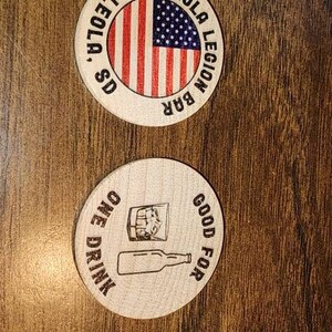Customer photo of their custom wooden nickels