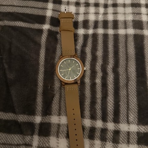 Tom added a photo of their purchase