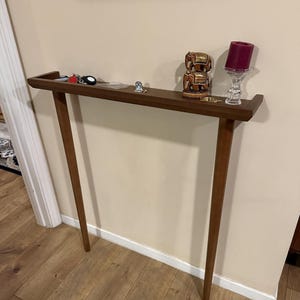 Amala added a photo of their purchase