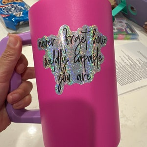 Marjorie added a photo of their purchase