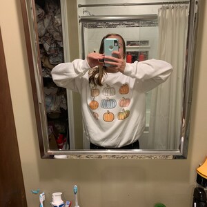 Taylor added a photo of their purchase