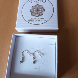 Angela added a photo of their purchase