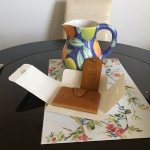 Sheila added a photo of their purchase