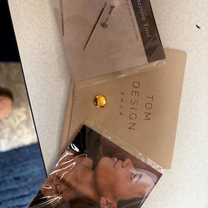 Samantha added a photo of their purchase