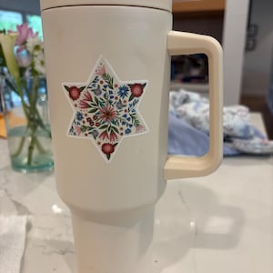 Mayela added a photo of their purchase