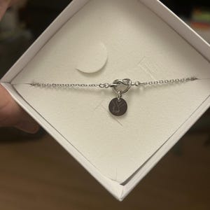 CLAIRE added a photo of their purchase