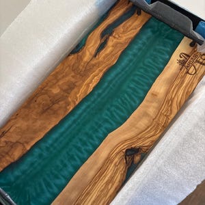 Alexandra added a photo of their purchase