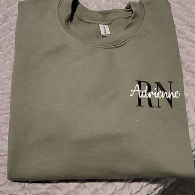 Nurse Essentials Embroidered Sweatshirt (Unisex) main image 0