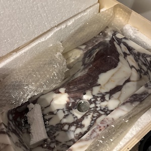 Oksana added a photo of their purchase
