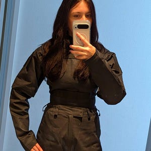 Emi added a photo of their purchase