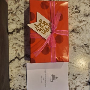carrie added a photo of their purchase