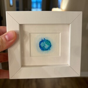 Jenna added a photo of their purchase