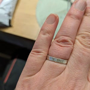 Lizzie added a photo of their purchase