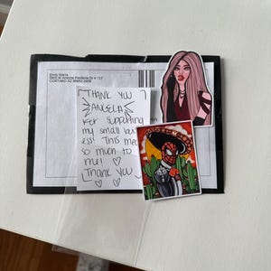 Angela added a photo of their purchase
