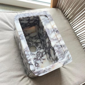 Amelie added a photo of their purchase
