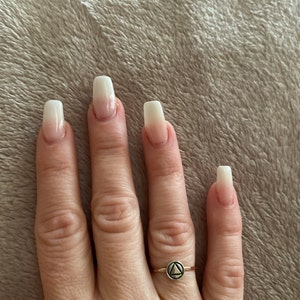 Tasha added a photo of their purchase