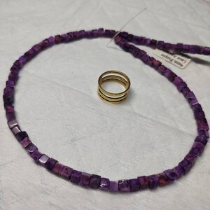 thumbnail image 2 of Light Blue Sea Sediment Jasper Heishi Disc Beads - 2x4mm 3x6mm 15.5 Inch Strand 2 of 6