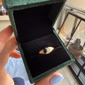 Caitlin added a photo of their purchase