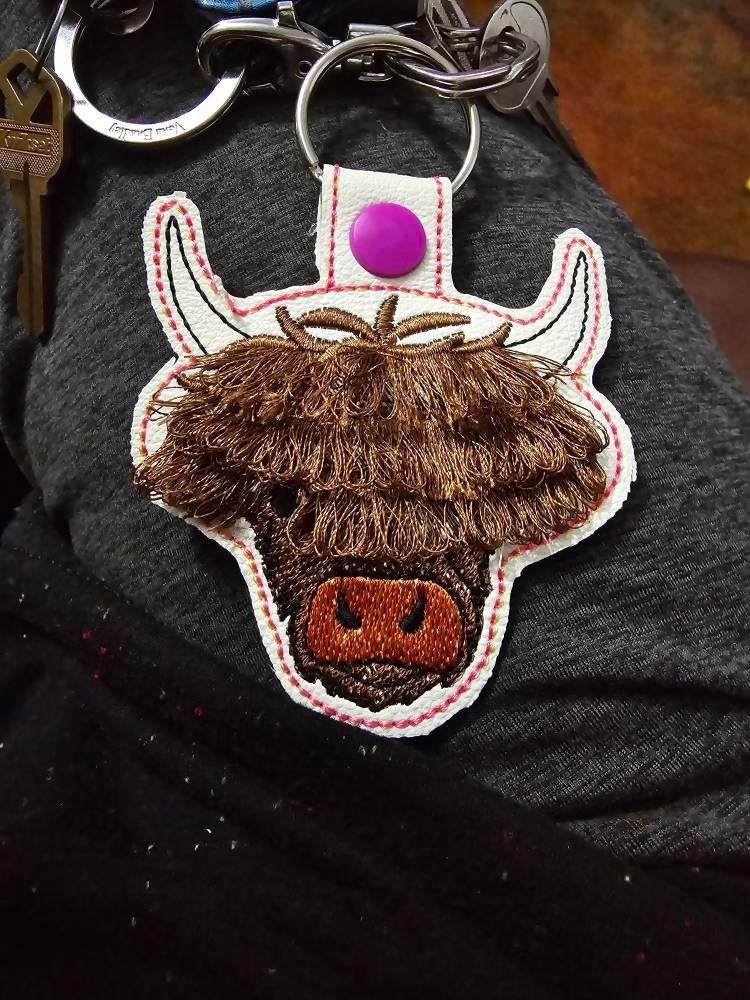 Fringed Highland cow keychain key fob snap tab in the hoop machine embroidery designs ITH project Awesome fluffy fur cow kids backpack tag