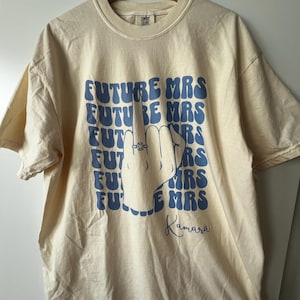 Leni added a photo of their purchase