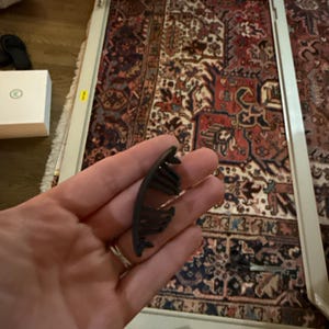 Sarah added a photo of their purchase