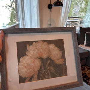 Tina added a photo of their purchase