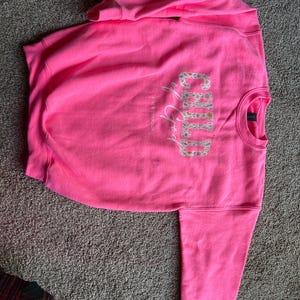 Kayla added a photo of their purchase