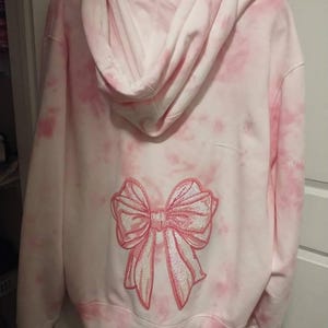 Nicole added a photo of their purchase