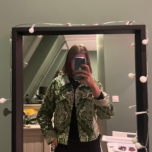 Charlotte added a photo of their purchase