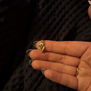 Sarah added a photo of their purchase