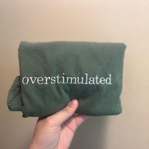 Laura added a photo of their purchase