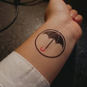 The Umbrella Academy / Umbrella Logo / Temporary Tattoo / Arm - Etsy The Umbrella Academy / Umbrella Logo / Temporary Tattoo / Arm - Etsy