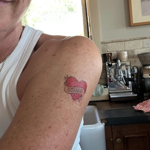 Sara added a photo of their purchase