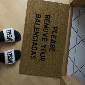 take off your balenciaga's doormat