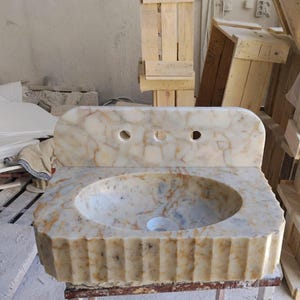 Becky added a photo of their purchase