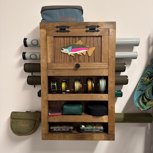 fishing rod holder cabinet POKIPO Holders for Garage,Fishing Rod Rack Storage up to 18 Rods,3 Tier Adjust Heavy Duty Metal Fish Pole Stand Organizer with Pegboard for Fishing Gear and Equipment Accessories pending removable insert technology Shelf Fly Rod Display Case