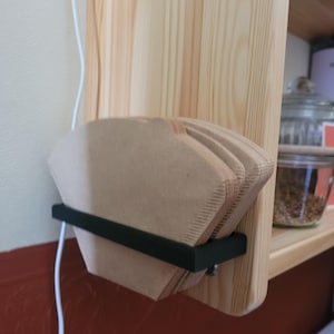 Sabine added a photo of their purchase