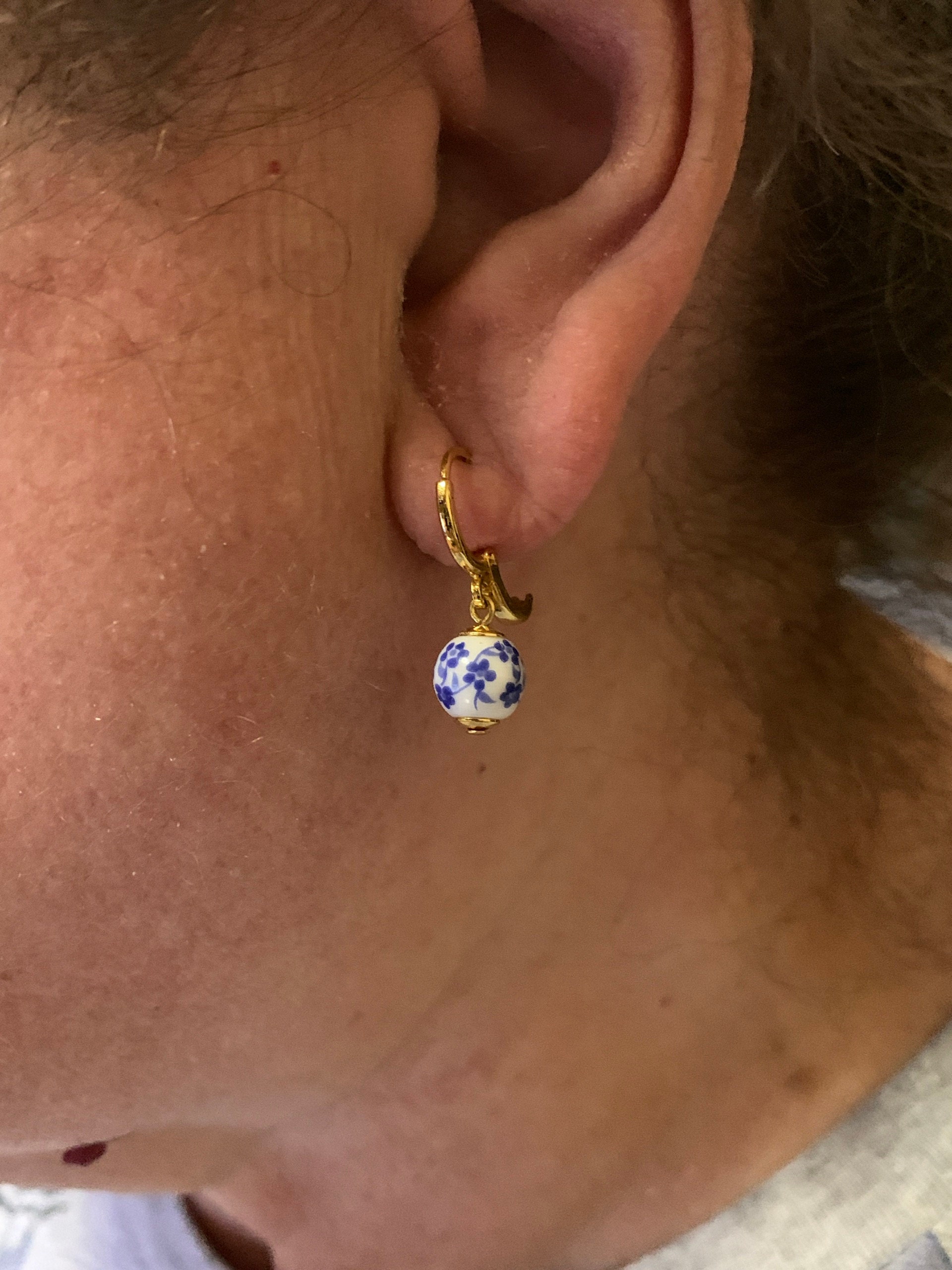 Blue & White Floral Ceramic Bead Charm Huggie Hoops, Choose 18K Gold Plated or Silver Plated, Handmade Hoop Earrings by Detail London.