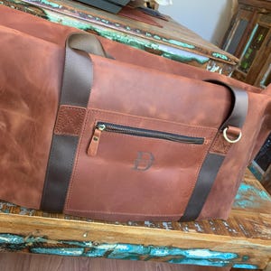 Kimberly added a photo of their purchase