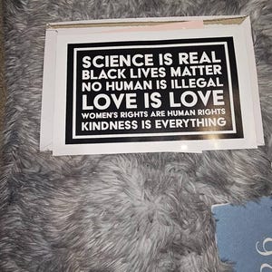 Laura added a photo of their purchase