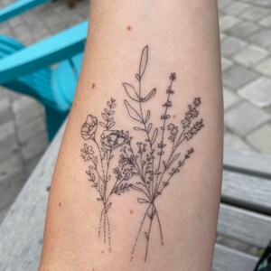 Laura added a photo of their purchase