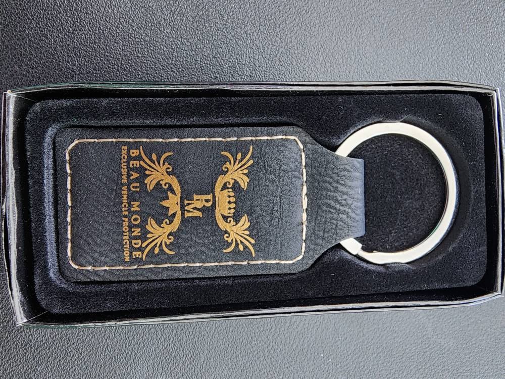 Customer photo of Custom Logo Engraved / Etched Leatherette Keychain from amanda