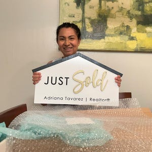 Adriana added a photo of their purchase