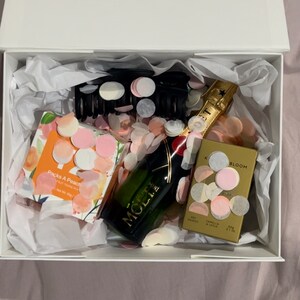 Gina added a photo of their purchase