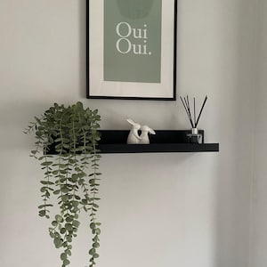 Sharon added a photo of their purchase