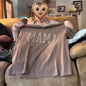 Gloria added a photo of their purchase